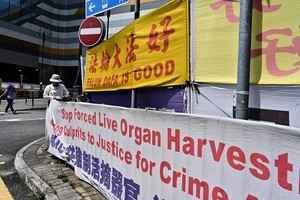 美媒：中共迫害法輪功二十年 須承擔罪責